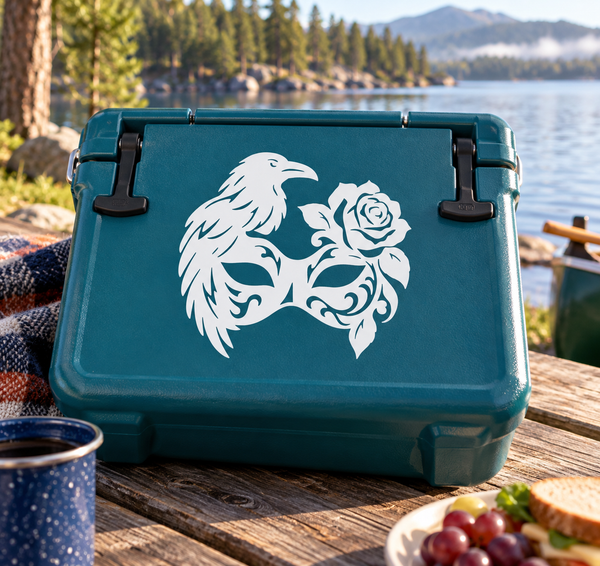 Teal surface with white raven half-mask vinyl decal and rose design