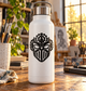 Vinyl mask decal with black gear-crowned face emblem on white bottle
