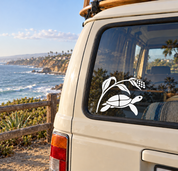 Black stylized turtle vinyl decal on car window with shell and flipper details
