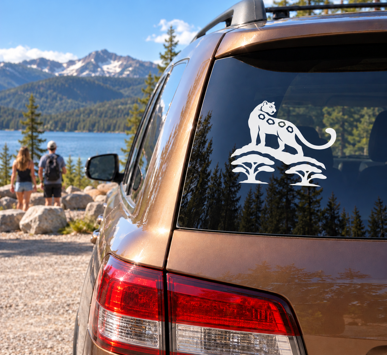 Jaguar vinyl decal of white jaguar guardian on dark car window