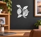 Black vinyl harvest decal with cocoa pod, corn cob, and leaves on wall