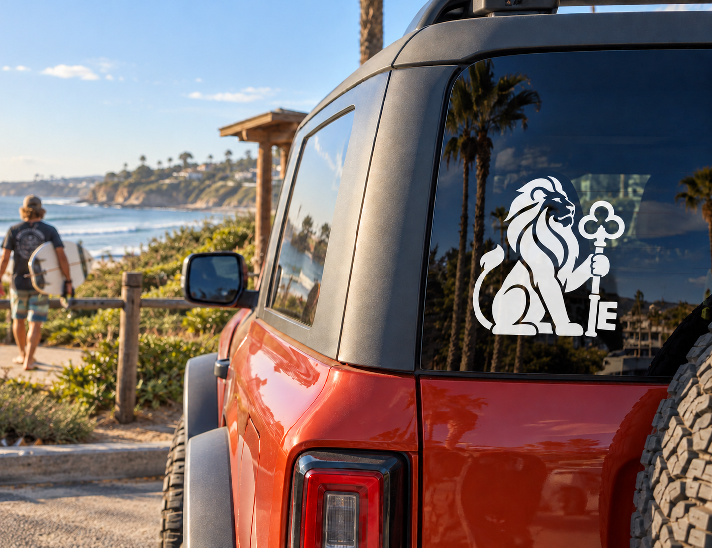 Black lion and castle key vinyl decal on car rear window