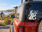 Black lion and castle key vinyl decal on car rear window