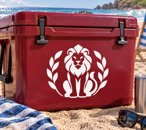 Vinyl lion medallion decal with laurel leaves on a red cooler lid