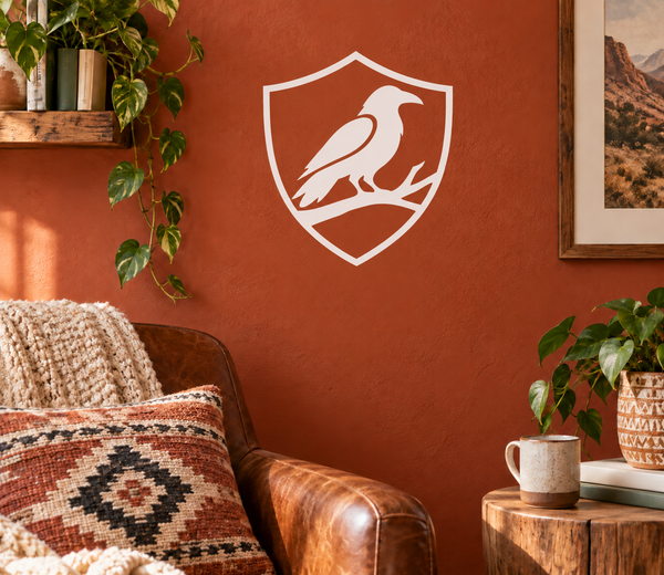 Shield vinyl decal with white outline and raven wing emblem
