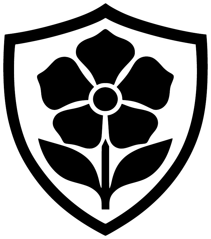 Shield vinyl decal featuring a black floral crest with central round flower shape