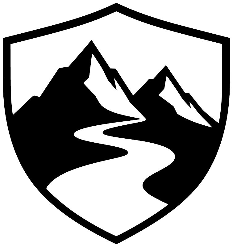 Close-up vinyl shield decal with black mountains and white forest river