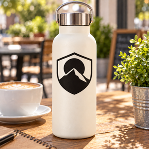 Medieval shield vinyl decal with black mountain icon on a white background