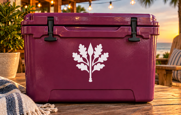 White oak tree and spear crown vinyl decal on maroon surface