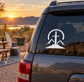 Vinyl decal emblem with sword and mountain silhouette in a circular outline on car window