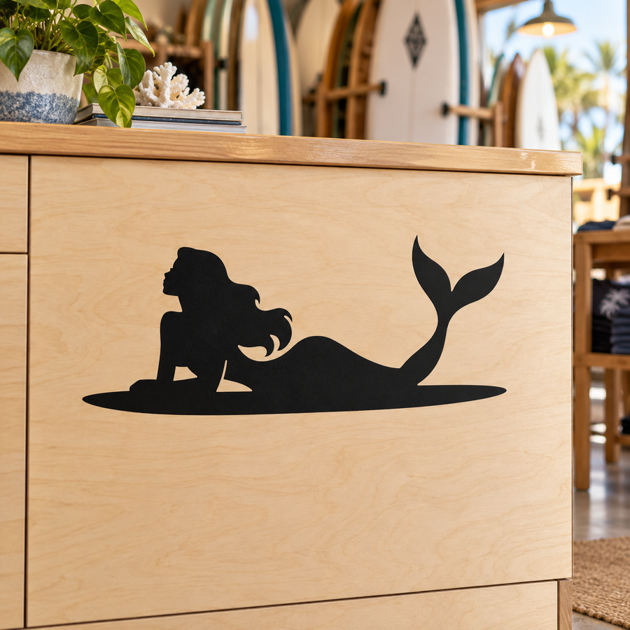 Black mermaid vinyl decal on wood cabinet door