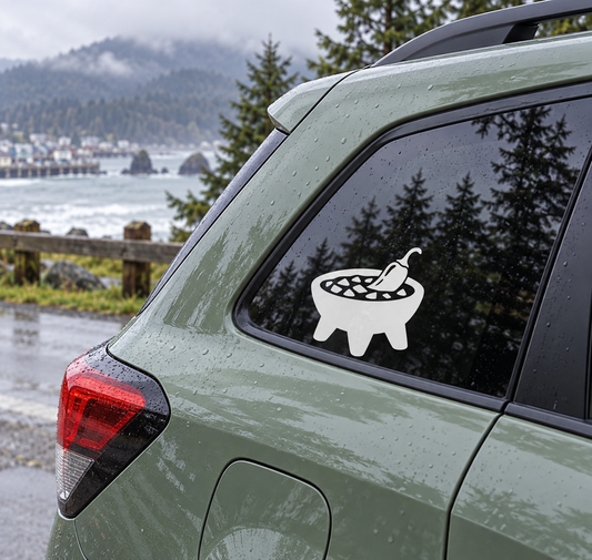 Molcajete salsa vinyl decal on car window: black bowl with white salsa pieces and spoon