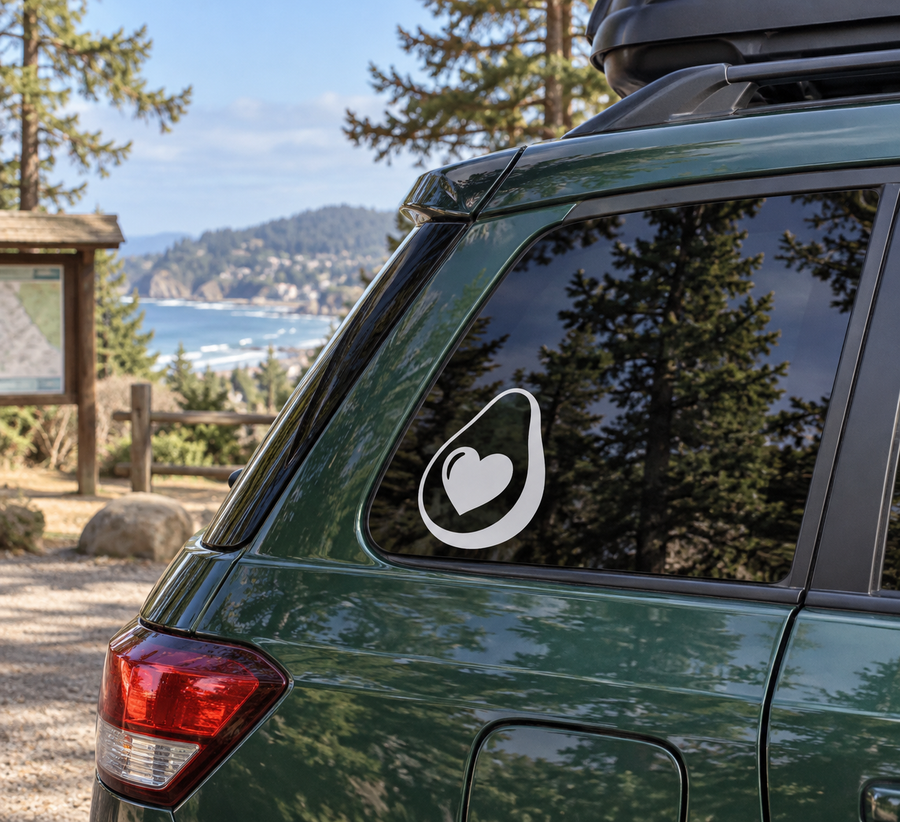 White avocado heart vinyl decal on car window, outline with inner heart icon