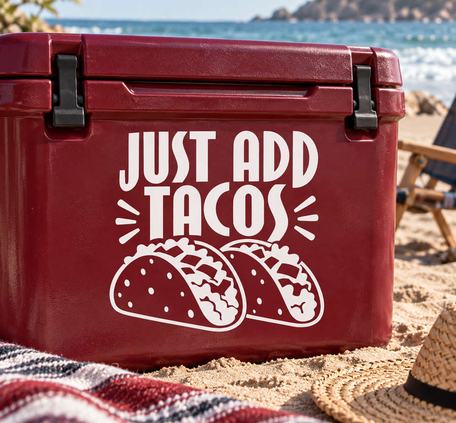 Vinyl taco decal with “JUST ADD TACOS” text and two tacos on a red surface
