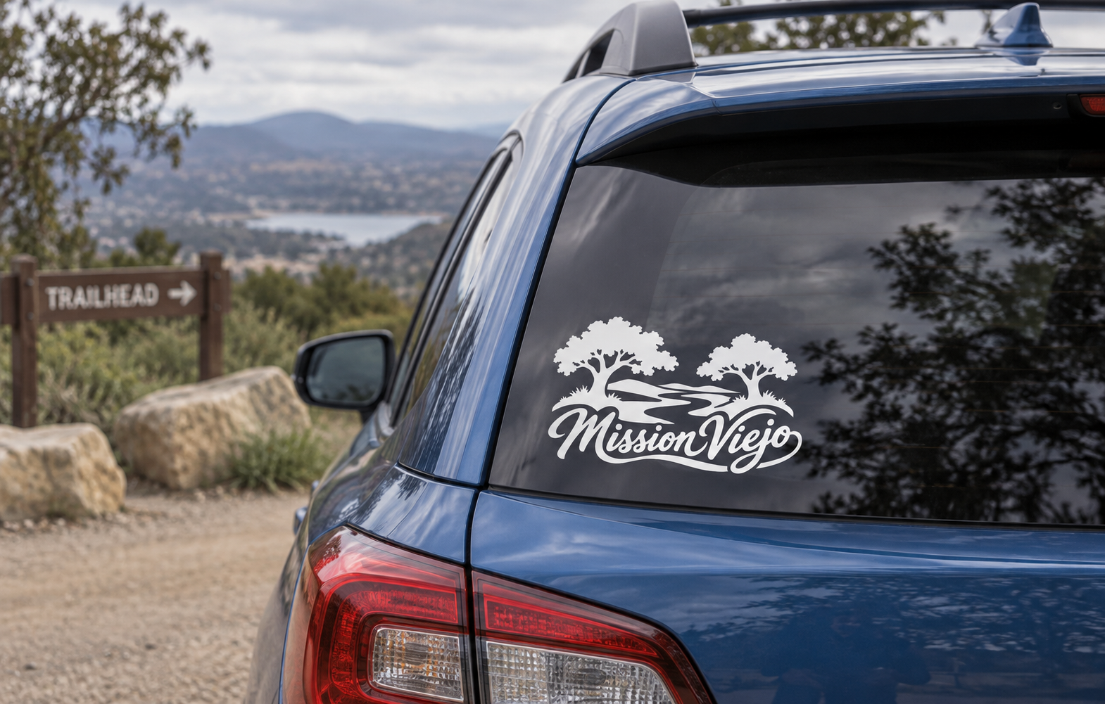 White MissionViejo wordmark vinyl decal on car rear window