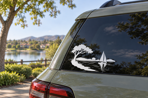 Lakeside sailboat icon vinyl decal with tree, lake water, and sailboat silhouette