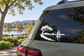 Lakeside sailboat icon vinyl decal with tree, lake water, and sailboat silhouette