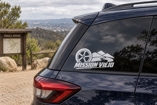 Mission Viejo trail bicycle vinyl decal on car rear window with wheel and wordmark