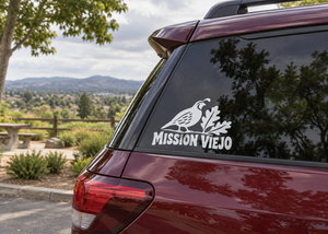 Vinyl decal of quail and Mission Viejo wordmark on car rear window
