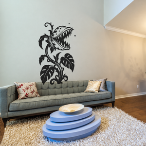 Black monster flower wall decal with spotted T-rex mouth and split leaves