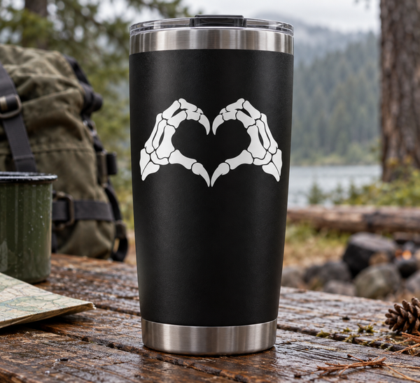 Bone hand heart vinyl decal on black tumbler, white graphic design