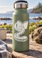 Tentacle holding book vinyl decal on light green water bottle