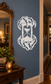 White bone hand and hourglass vinyl decal with flame-like border