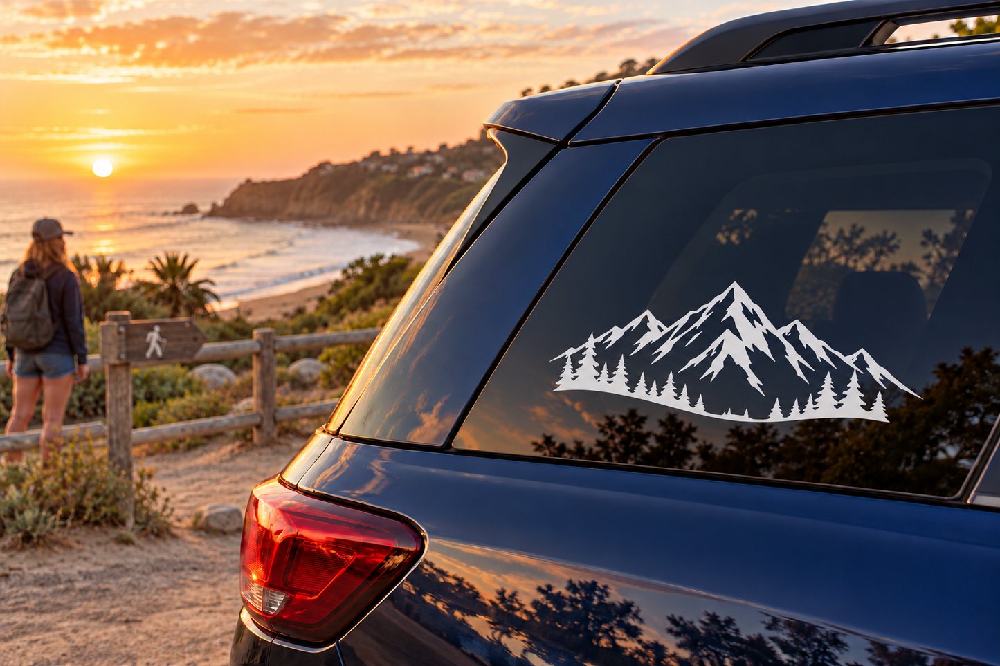 Vinyl car window decal with snowy mountain peaks and curved pine forest illustration