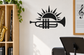 Black trumpet and sunburst vinyl decal on a wall