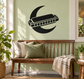Vinyl decal of black harmonica over crescent moon