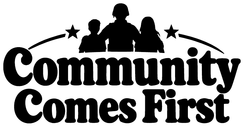 Vinyl wall decal close-up: 'Community Comes First' bold arched text with silhouettes