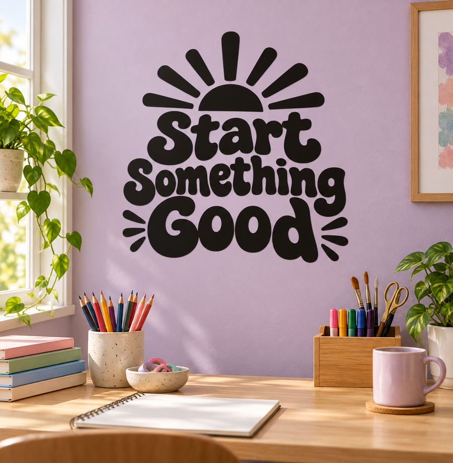 Vinyl decal with black “Start Something Good” lettering and sunburst rays on wall