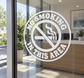 Circular no smoking vinyl decal with cigarette icon and 'No Smoking in this area' text