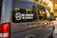 No smoking in vehicle vinyl decal on car side window, circular icon and text