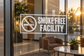 Smoke-free facility corner vinyl decal with no-smoking symbol and bold text