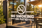 No smoking on patio vinyl decal with crossed cigarette icon and bold text