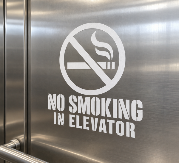 No smoking in elevator vinyl decal with crossed cigarette icon and text