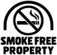Black and white no smoking property vinyl decal with arch, smoke icon, and big 'SMOKE FREE PROPERTY'