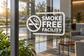 Corner smoke-free facility vinyl decal with no-smoking icon and 'SMOKE FREE FACILITY'