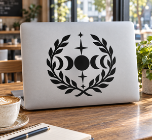 Moon phase laurel vinyl decal with black crescent moon and star wreath