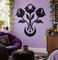 Three Moon Flowers vinyl decal: black three-moon floral silhouette with central flower and crescent