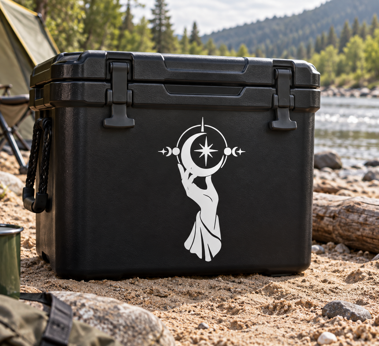 White vinyl decal of a hand holding a crescent moon with star and wand symbols