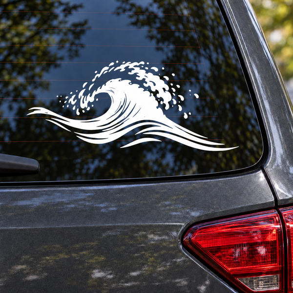 White ocean wave vinyl decal on rear side window of a dark car