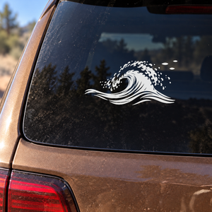 Wave crest vinyl decal with foamy spray on car rear window