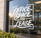 Vinyl decal with white Office Space for Lease lettering on window glass
