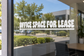 White horizontal vinyl decal reading 'OFFICE SPACE FOR LEASE'