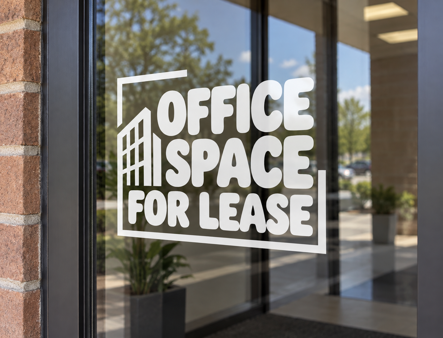 Window vinyl decal with stacked 'OFFICE SPACE FOR LEASE' lettering in white