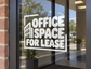 Window vinyl decal with stacked 'OFFICE SPACE FOR LEASE' lettering in white