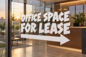 Directional vinyl decal with 'OFFICE SPACE FOR LEASE' and right arrow, white letters