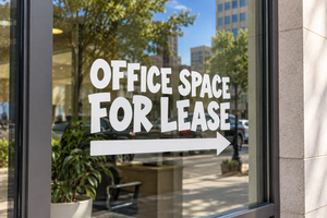 Directional vinyl decal with 'OFFICE SPACE FOR LEASE' text and right arrow